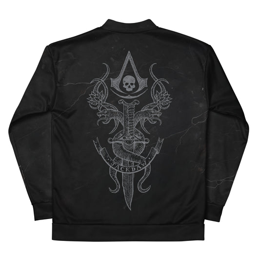 Black bomber jacket, back view. Grey 'Assassin's Creed Jackdaw' emblem with a skull, snakes, and a sword on textured fabric.
