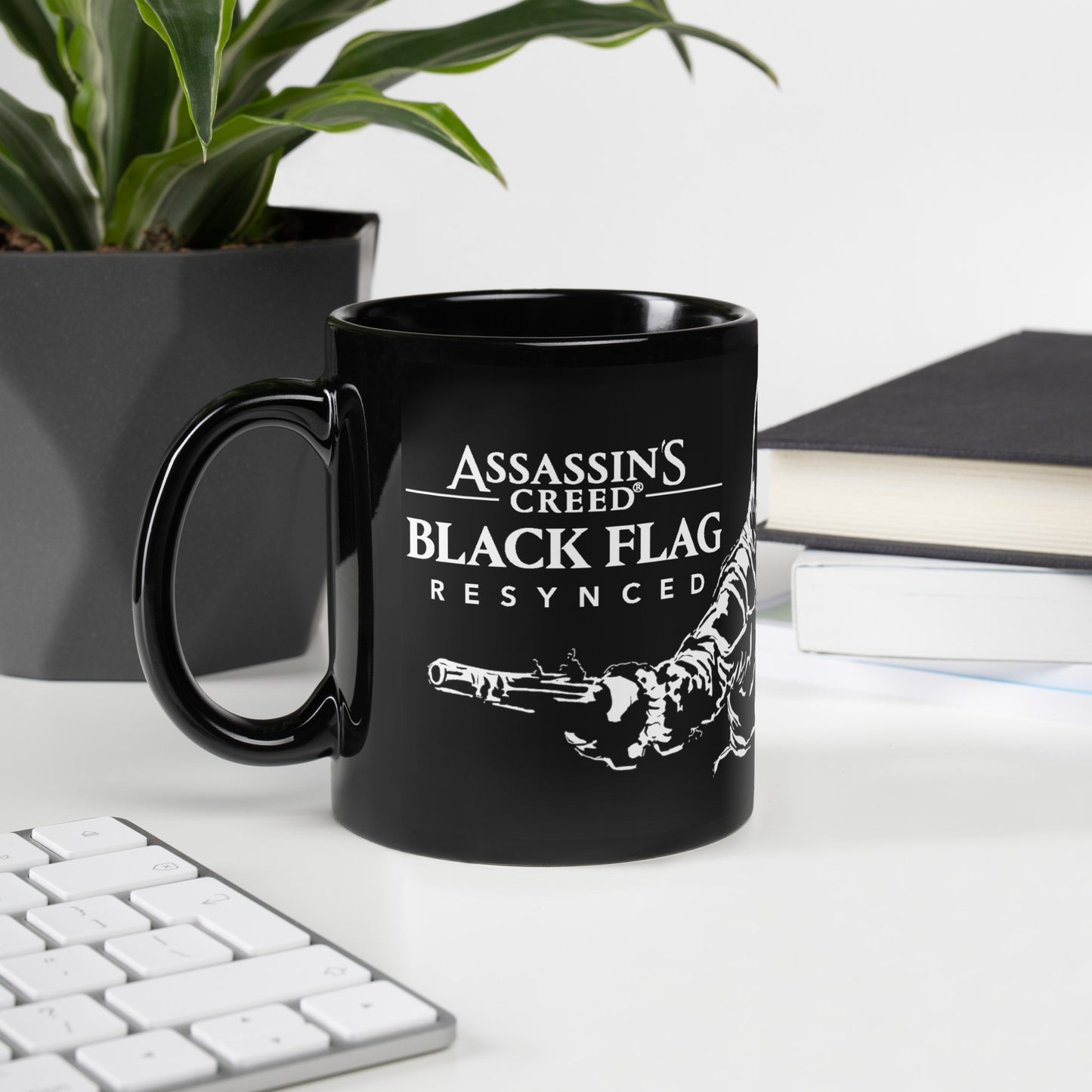 White outline illustration of a pirate's arm in a coat and sash, holding a flintlock pistol, on a black mug.