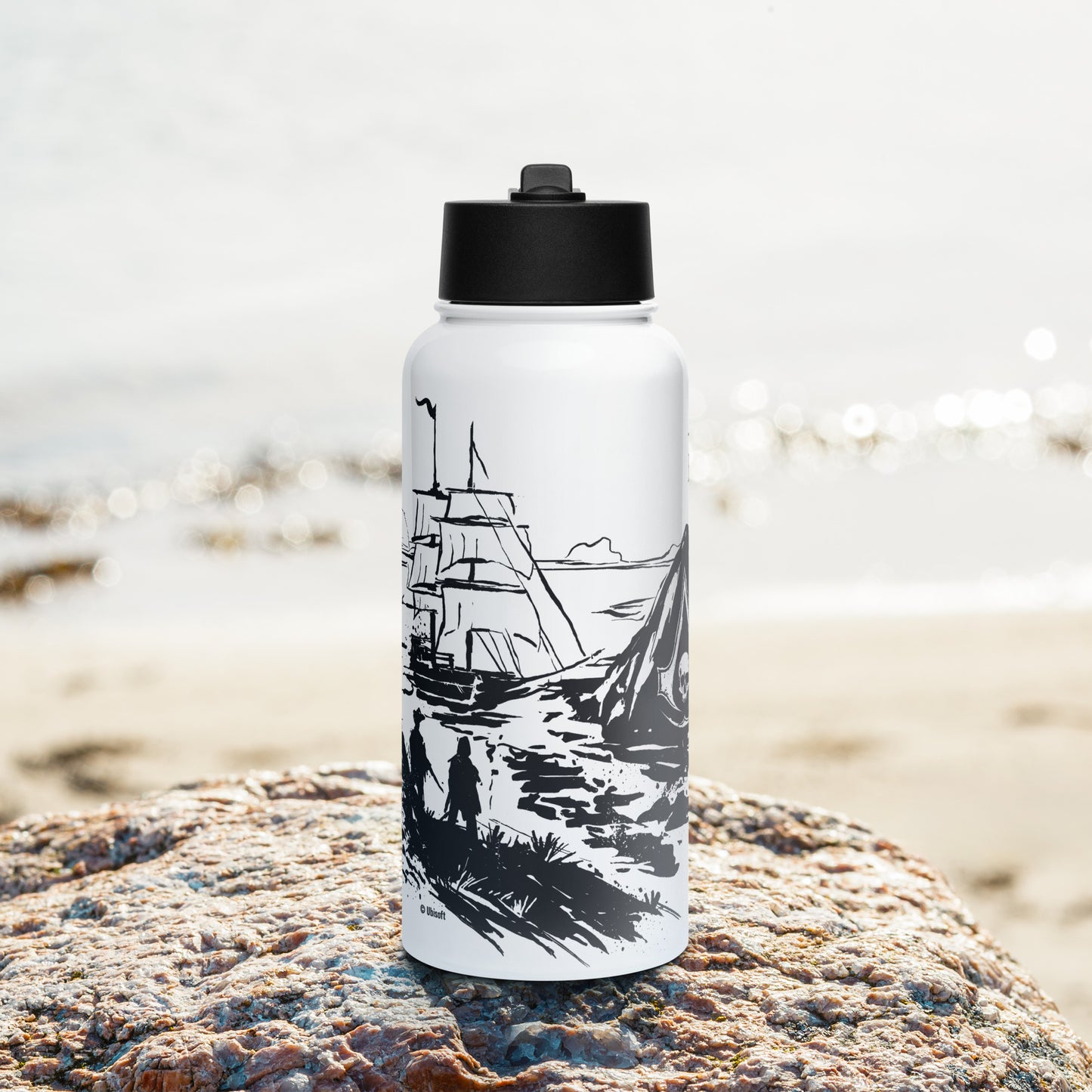 Black and white illustration on water bottle: a pirate ship, two figures, and a tent on a sandy shore.