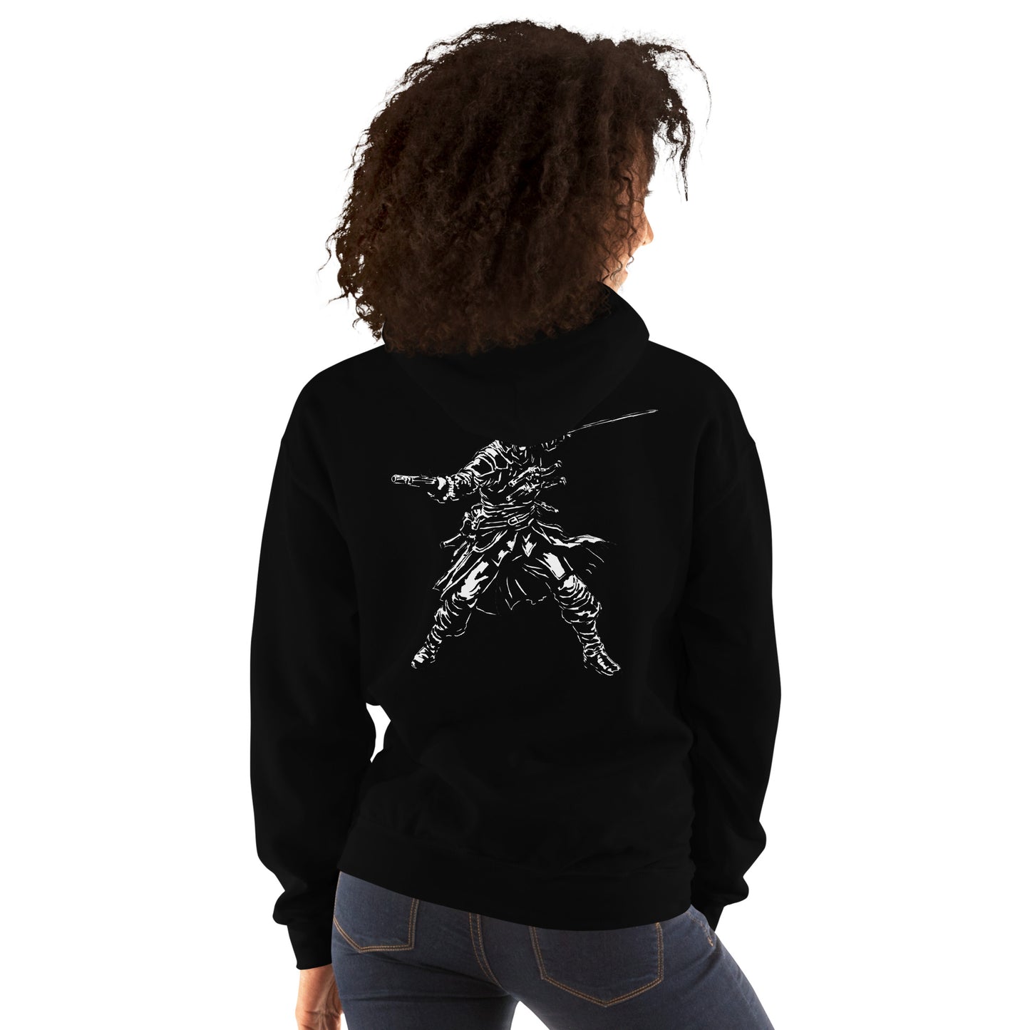 Back of a person in a black hoodie and jeans. A white graphic of a warrior with a sword and gun is on the back.