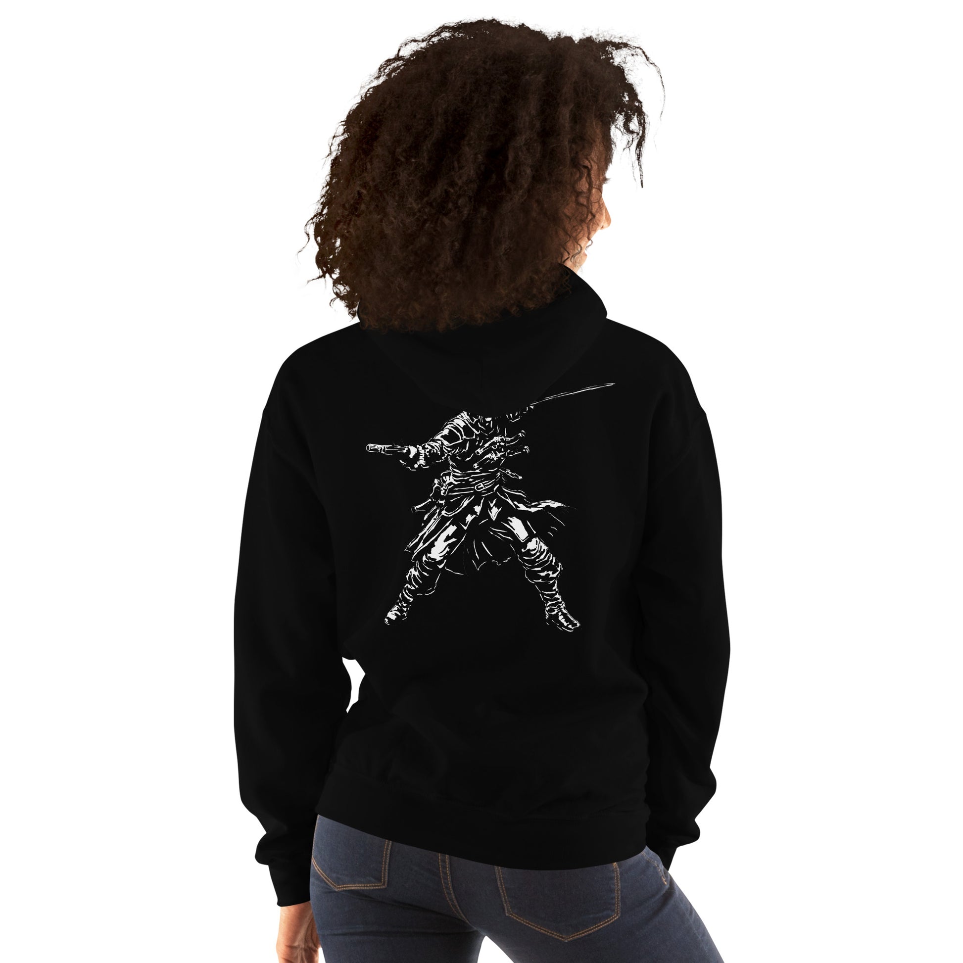 Back of a person in a black hoodie and jeans. A white graphic of a warrior with a sword and gun is on the back.